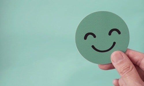 employee-wellbeing-green-smiley-1-min-1